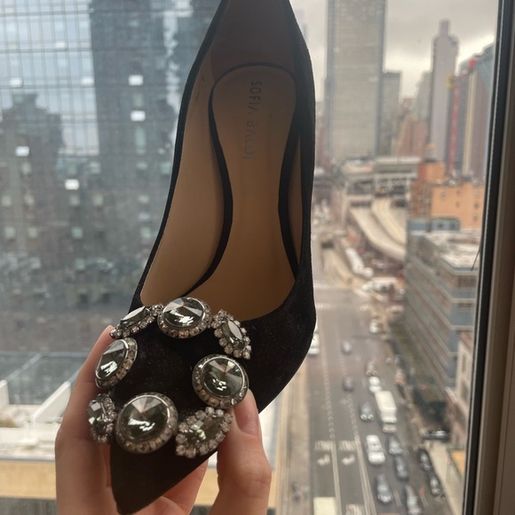 Italian high heel shoes with diamond embellishments.